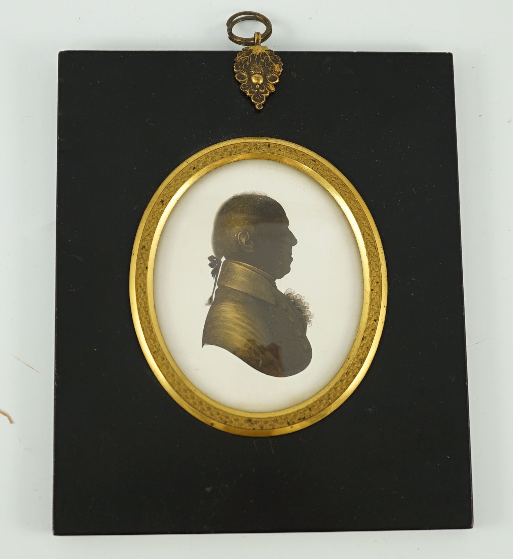 John Miers (1756-1821), Silhouette of a gentleman, painted and bronzed plaster, 8 x 6.5cm.